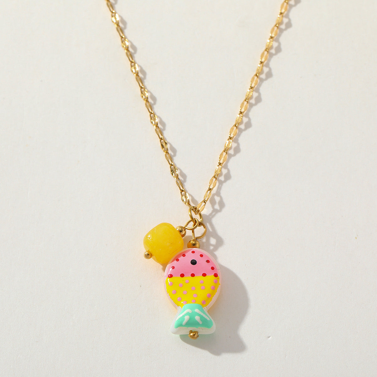 COLLAR AVE MARINO- AMARILLO