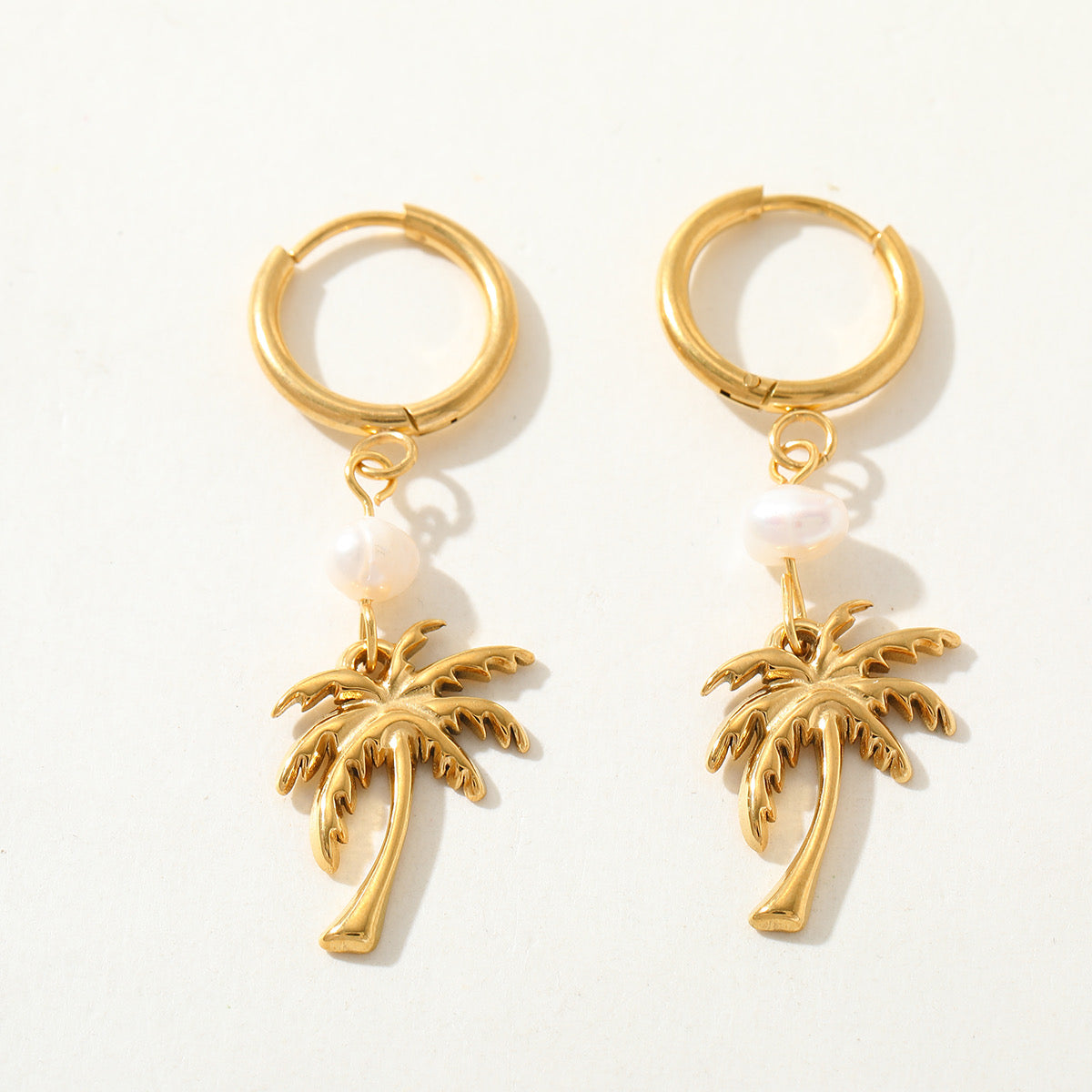 PENDIENTES PALMERA DORADA